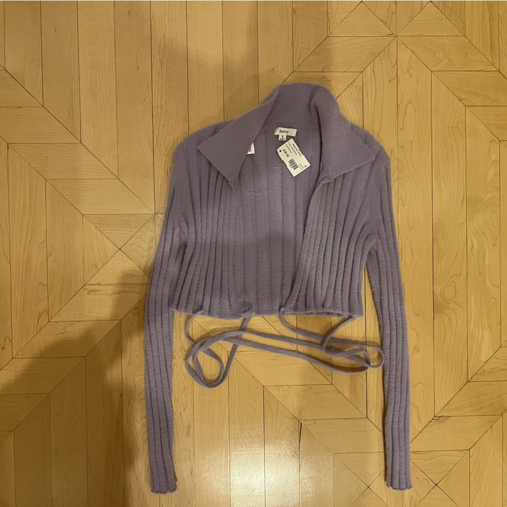 UNWORN wrap around cropped sweater